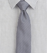 A power style for the power player, crafted in a luxurious silk blend, enhanced with a contrasting thin stripe pattern.About 2½ wide62% silk/38% cottonDry cleanMade in USA of Italian fabric