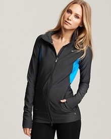 A workout must-have for cooling temps, this Nike jacket boasts handy thumb holes at the cuffs and Dri-FIT technology to wick away moisture.