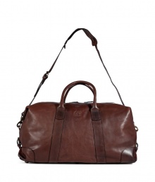 Both classic and contemporary, Ralph Laurens leather duffle bag is a timeless choice for stashing away your essentials - Double top handles, removable buckled shoulder strap, buckled sides, top zip, inside zippered pocket - Pack to the brim for travel, or tote around workout gear for trips to the gym