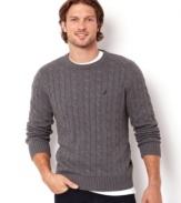 Fashionably appealing and classically stylish is this regular fit cable crew neck sweater by Nautica.