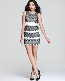 Classic in black and white, BCBGMAXAZRIA goes back to basics with this timeless dress, rendered in tiers of scalloped lace mixed with pintucked panels.