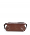 Stash away your travel essentials in Ralph Laurens classic brown leather dopp kit - Embossed logo detailing on front and sides, push-stud detailed side tabs double as carrying handles, top zip, inside zippered back wall pocket - Tuck into chic luggage or duffle bags for trips to the gym