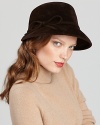 A side bow and asymmetrical brim lend modern charm to this hand-blocked velour cap from Eric Javits.