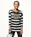 Sealed with a kiss: Material Girl's striped sweater gets wild with a leopard lipstick-mark print!