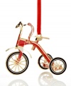 Feel like a kid on Christmas morning with a shiny red and gold tricycle outfitted with streamers and a bell. From ChemArt.