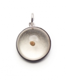 Sing the praises of spiritual devotion with this mustard seed charm from Rembrandt. Crafted in sterling silver. Approximate drop: 3/4 inch.