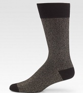 A soft, textured cotton blend lends everyday style and comfort to your wardrobe.Mid-calf height62% cotton/26% nylon/10% metallic/2% spandexMachine washImported