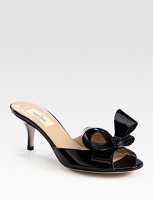 Couture-inspired patent leather slide with an oversized bow adornment and kitten heel. Self-covered heel, 2 (50mm)Patent leather upperLeather lining and solePadded insoleMade in ItalyOUR FIT MODEL RECOMMENDS ordering one half size up as this style runs small. 