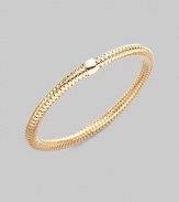 From the Primavera Collection. A basketwoven design in 18K yellow gold with a single bead accent.18K yellow gold Diameter, about 65mm, (2.56) Made in Italy