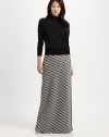 An elongated maxi skirt with an diamond pattern and stunning shimmer. Elasticized waistbandPull-on styleAbout 48 long75% merino wool/20% polyester/5% metallic threadHand washImported Model shown is 5'9 (175cm) wearing US size Small. 