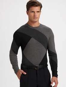 A bold, graphic pattern enhances this casual classic, shaped in fine wool.Crewneck95% viscose/5% elastaneDry cleanImported