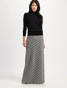 An elongated maxi skirt with an diamond pattern and stunning shimmer. Elasticized waistbandPull-on styleAbout 48 long75% merino wool/20% polyester/5% metallic threadHand washImported Model shown is 5'9 (175cm) wearing US size Small. 