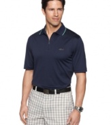 Stay cool and dry no matter how your game is going in this zip-placket polo shirt from Greg Norman for Tasso Elba.