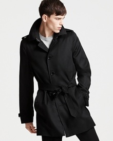 A sleek, single-breasted silhouette in classic black. From Burberry.