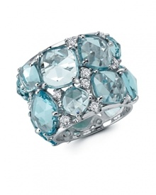 Put on a bold piece of rock candy with this chunky cocktail ring from Crislu. Accented by aquamarine-colored stones, it's a sweet statement piece.