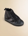 Classic high-tops in classic checks of woven cotton with rich leather trim.Tie frontCotton check upperLeather toe and trimRubber soleImported