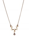 Why? Because you'll love it. This Y-shaped necklace from Givenchy is crafted from brown gold-tone mixed metal with glass pearls making a stunning statement. Approximate length: 16 inches + 2-inch extender.