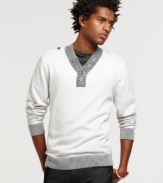 With a cool dose of laid-back collegial style, this sweater from Bar III reworks your casual wardrobe the right way.