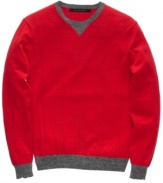 Cable guy. This sweater from Sean John elevates a classic look with cool, streetwise styling.