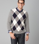 A large argyle pattern gives this Tommy Hilfiger sweater prepster style for that off-campus Ivy-cool look.