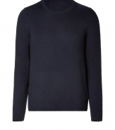 Elegant pullover in a fine dark blue wool and cashmere blend - Classic crew neck style - The cut is slim and straight with long sleeves - A casual classy basic for everyday wear - Very light, soft material - Small ribbed cuffs on the sleeves and hem - A classic favorite piece that works with all types of pants for leisure and business