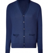 Stylish cardigan in fine, medium blue cotton and silk blend - Super-soft, densely woven fabric feels great against the skin - Elegant, deep v-neck and two small pockets at hip - Contrast trim button placket extends from chest to hem - Modern silhouette is straight and slim - A polished, versatile basic in any wardrobe - Dress up with a button down, ankle-cropped trousers and leather lace-ups, or go for a more casual look with a t-shirt, jeans and trainers