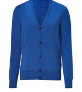 Preppy-chic is all over this cornflower blue cardigan in fine virgin wool - Wonderful soft, warm and versatile - Classic cut with deep v-neck, long cuffed sleeves and contrasting half-placket - Wear to the office over a favorite tee and dark jeans or khakis