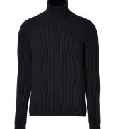 Stylish knitted sweater in a navy wool-silk blend - Modern with a classic ribbed look, slim cut, long sleeves and turtle neck - Perfect basic piece for everyday - Wear solo or as a layering piece - Try with jeans, chinos or suit pants