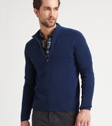 A sleek, knit pullover made from Italian extra-fine wool.Stand collarLong sleevesZipper placketPull-on styleWoolDry cleanImported of Italian fabric