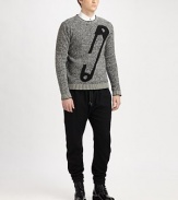 A classic crewneck sweater with an iconic McQ Alexander McQueen design.CrewneckLong sleevesContrast trimVirgin woolDry cleanImported