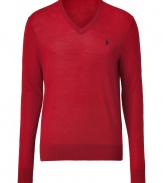 Radiant in red merino wool, Ralph Laurens V-neck pullover is a great basic for this season and next - Embroidered logo, V-neckline, long sleeves, fine ribbed trim - Contemporary slim fit - Wear over shirts or tees with jeans, cords or chinos