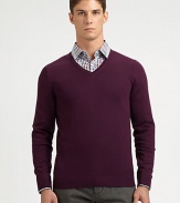 Slim-fitting, extra-fine virgin wool sweater with contrast color detail at inside collar trim.V-neckRibbed knit cuffs and hemWoolDry cleanImported