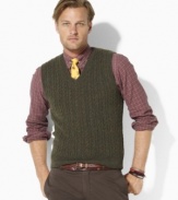 A classic sweater vest is the hallmark of preppy style in luxurious cable-knit merino lambswool.