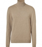 Classic cashmere turtleneck pullover is wonderfully soft and easy to wear - Elegant camel color makes it a versatile basic - Slim fit with long sleeves and ribbing at sleeves and hem - Perfect sweater for work or play with jeans, chinos and suit pants - Pair with a boots or lace-ups