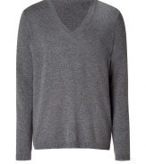 Elegant pullover in a fine medium grey heather wool and cashmere blend - With a deep V-neck - The cut is slim and straight with long sleeves - A casual classy basic for everyday wear - Very light, soft material - Small ribbed cuffs on the sleeves and hem - A classic favorite piece that works with all types of pants for leisure and business