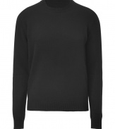 Quietly elegant and effortlessly cool, Jil Sanders black wool pullover raises the bar on everyday indispensables - Classic crew neck style, in a soft, densely woven medium-weight Italian wool - Rib trim at cuffs, collar and sleeves - Slim, straight cut - Versatile and polished, seamlessly transitions from work to weekend - pair with slim trousers, chinos or dark denim