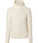 Anything but basic, this must-have wool sweater from Parisian cult label Balmain is a fall essential - Large turtleneck, long sleeves, front textured cable knit pattern, slim fit - Pair with jeans, slim trousers, or corduroys