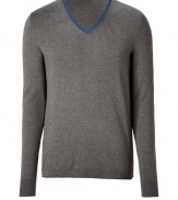 Polished, streamlined staples anchor any wardrobe, and Hugos medium grey pullover is a great go-to this season - Crafted from a lighter-weight, pure virgin wool - Classically slim, straight cut - Long, fitted sleeves and v-neck with decorative blue trim - Versatile and elegant, the perfect compliment to chinos, jeans or dress trousers