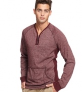 Drop some color into your cool with this zip front sweater from Bar III.