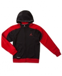 Keep him warm on and off the court with a classic Therma-fit hoodie from Nike Jordan.