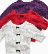 Bow accents amp up this fun girlie sweater from Jessica Simpson.