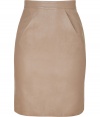 Luxe skirt in ultra-supple, beige leather - A sexy, sophisticated standout from French cult label Jitrois - Classic pencil cut is fitted and feminine, hits above the knee - Elegant dart detail at hips - Higher waist, zips at back - Flattering and polished, a must in any modern wardrobe - Pair with a blouse and blazer by day, or wear with a silk top and sandals by night