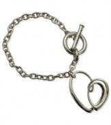 Make a heartfelt statement with this link charm bracelet from T Tahari. The bracelet, part of the Essentials Collection, is crafted from silver-tone mixed metal. Approximate length: 7-1/2 inches + 1-inch extender.