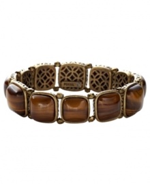 On top of the trends. Fossil's chic stretch bracelet is adorned with square-shaped tiger's eye stones set in oxidized brass tone mixed metal. Bracelet stretches to fit wrist. Approximate diameter: 2-1/4 inches.