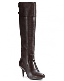 Sleek, seductive leather boots feature a slim heel and updated '70s styling. By Calvin Klein.