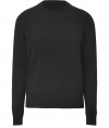 Quietly elegant and effortlessly cool, Jil Sanders black wool pullover raises the bar on everyday indispensables - Classic crew neck style, in a soft, densely woven medium-weight Italian wool - Rib trim at cuffs, collar and sleeves - Slim, straight cut - Versatile and polished, seamlessly transitions from work to weekend - pair with slim trousers, chinos or dark denim