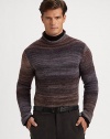 Elegant stripe pattern defines a winter wardrobe essential.Turtleneck51% acrylic/28% nylon/21% woolDry cleanMade in Italy