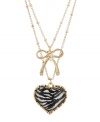 Earn your stripes. A chic zebra pattern defines this dramatic double-row necklace from Betsey Johnson. Featuring heart and bow emblems along with sparkling crystal accents, it's crafted in gold tone mixed metal. Item comes packaged in a signature gift box. Approximate length: 16 inches + 3-inch extender. Approximate drop: 1 inch (heart), 3/4 inch (bow).