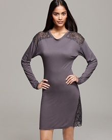 Heat up the bedroom in a body-hugging sleepshirt with sheer lace embellishments at shoulder and hem.