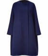 A pristine example of the contemporary Jil Sander look, this soft blue wool coat is a statement must-have for modern-minimalist wardrobes - collarless, seamed long dolman sleeves, hidden front snaps, side slit pockets, charcoal unlined interior - Oversized flared retro silhouette - Team with monochrome separates and jet black accessories